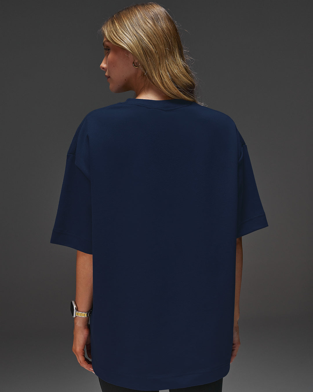 Woman wearing AfterDark ZeroCrease Oversized Tee - Future Navy | Model:Leilani | Size:XS