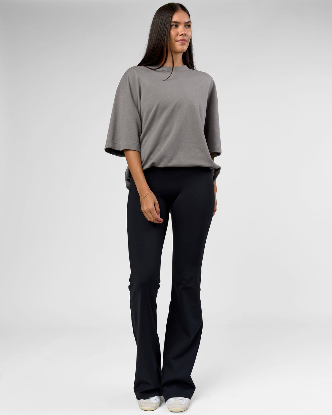 Woman wearing AfterDark ZeroCrease Oversized Tee - Storm Front | Model:Rhylee | Size:XS