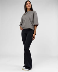 Woman wearing AfterDark ZeroCrease Oversized Tee - Storm Front | Model:Rhylee | Size:XS