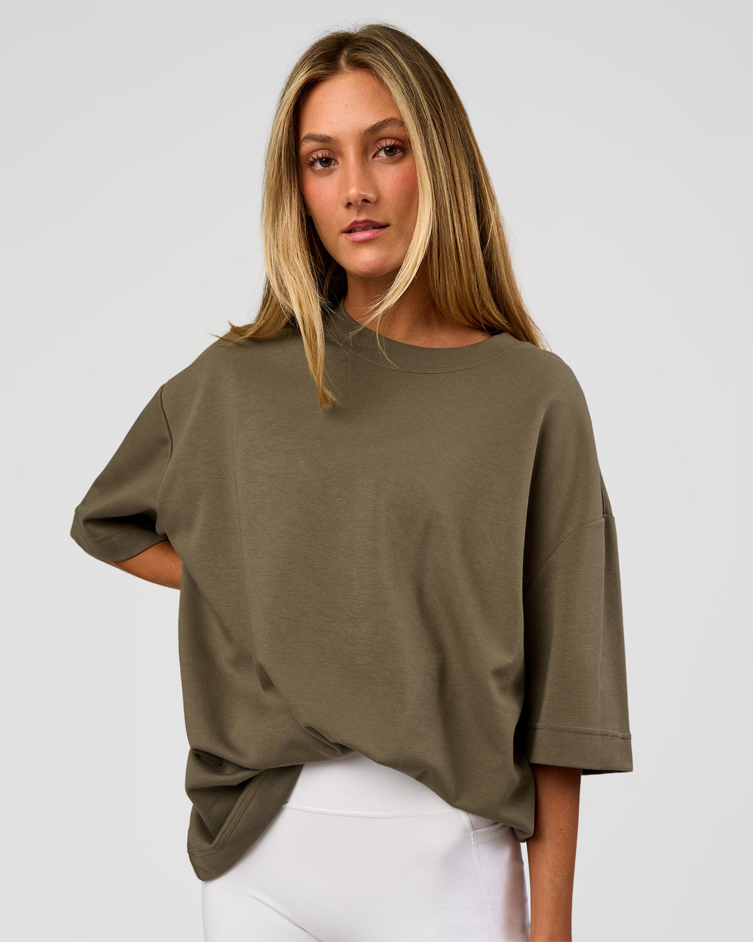 Woman wearing AfterDark ZeroCrease Oversized Tee - Walnut Grey | Model:Georgia | Size:XS
