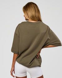 Woman wearing AfterDark ZeroCrease Oversized Tee - Walnut Grey | Model:Georgia | Size:XS