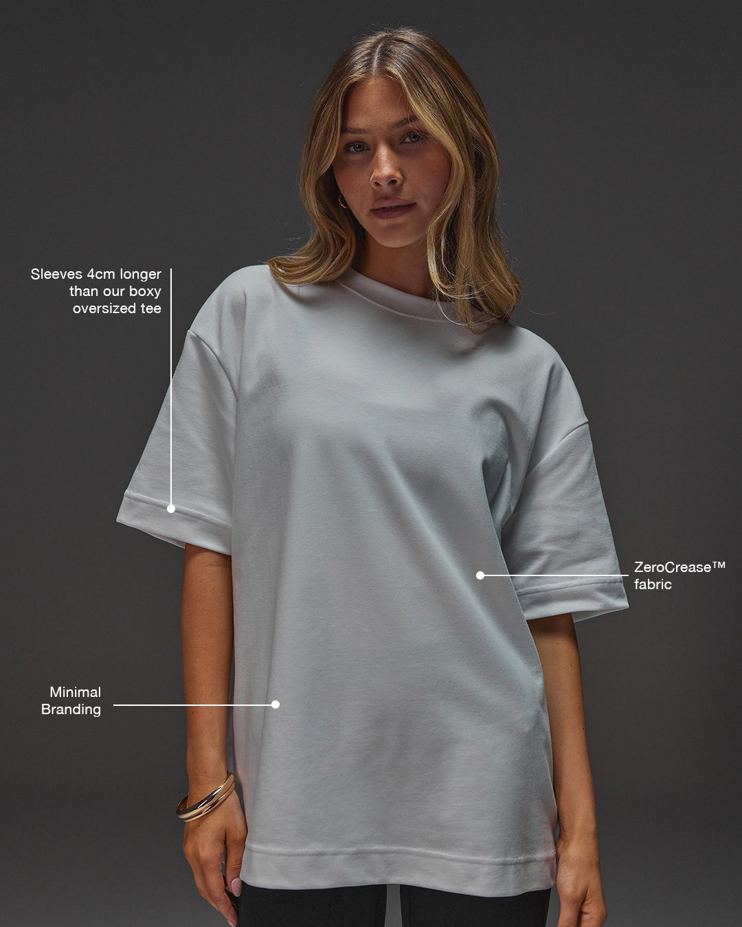 Woman wearing AfterDark ZeroCrease Oversized Tee - White | Model:Leilani | Size:XS