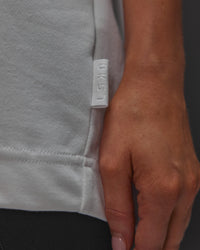 Woman wearing AfterDark ZeroCrease Oversized Tee - White | Model:Leilani | Size:XS