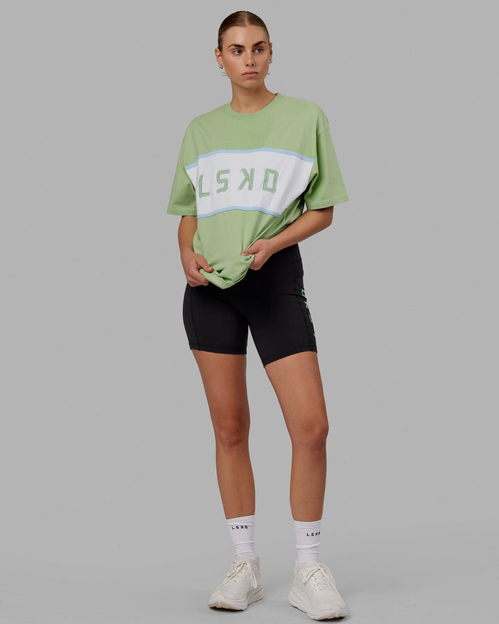 Woman wearing Unisex Aligned Heavyweight Tee Oversize - Green Fig