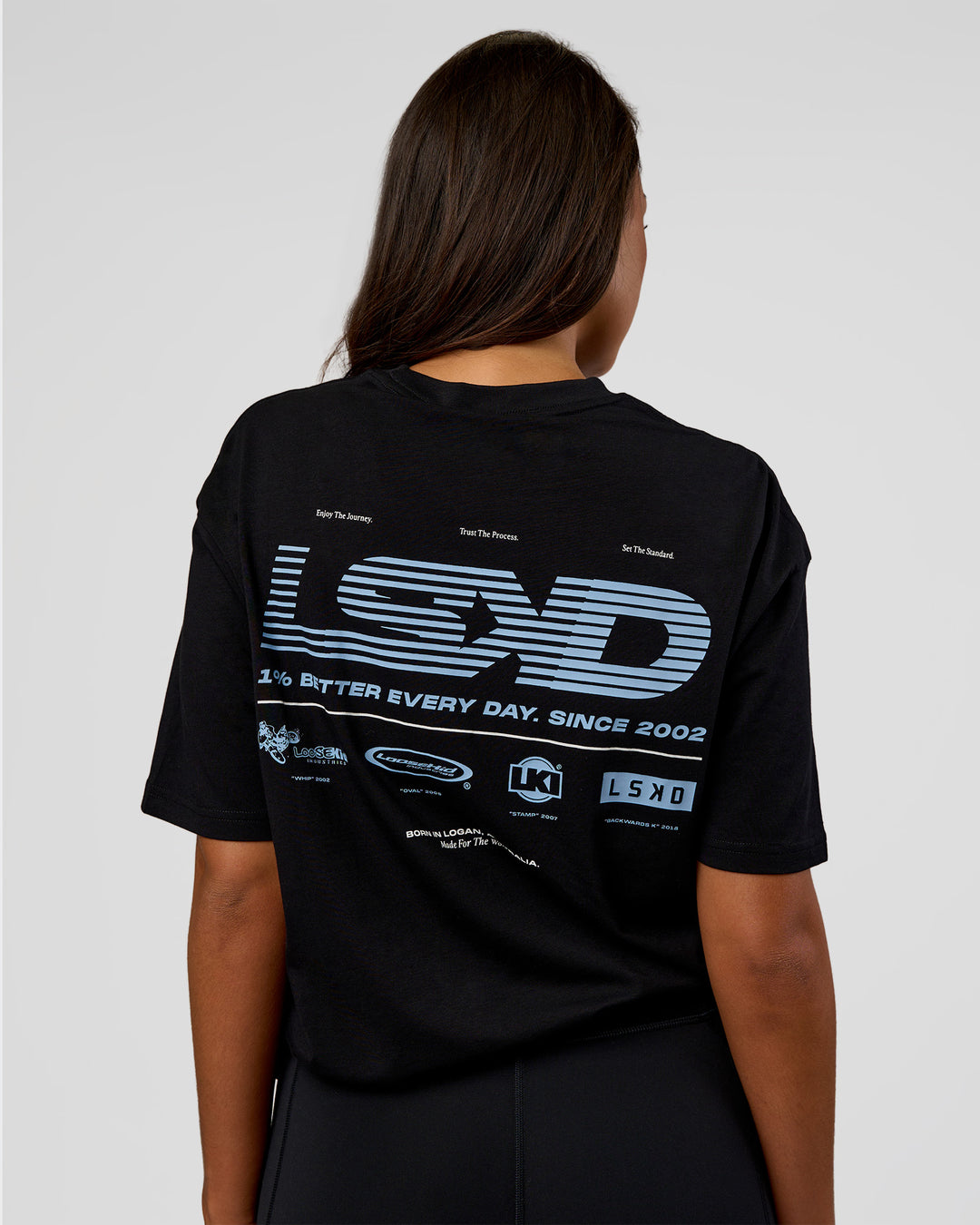 Woman wearing Archive FLXCotton Oversized Tee - Black-Open Air | Model:Kirstyn | Size:XS