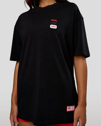 Woman wearing Archive FLXCotton Oversized Tee - Black-Scarlet | Model:Kirstyn | Size:XS