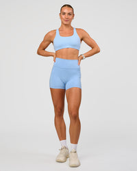 Woman wearing Aspire Sports Bra - Open Air | Model:Maja | Size:XS