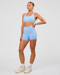 Woman wearing Aspire Sports Bra - Open Air | Model:Maja | Size:XS