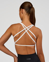 Woman wearing Aspire Sports Bra - White | Model:Brylee | Size:XS | Thumbnail Index: 4
