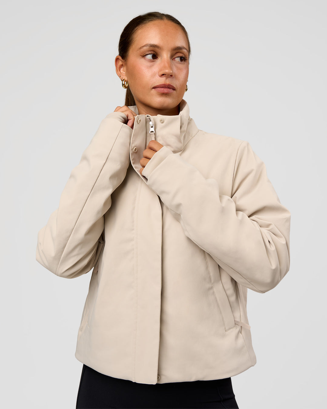 Woman wearing Auxiliary 2.0 Jacket - Shale Beige | Model:Brylee | Size:XS