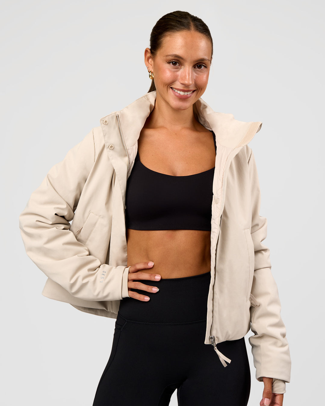Woman wearing Auxiliary 2.0 Jacket - Shale Beige | Model:Brylee | Size:XS