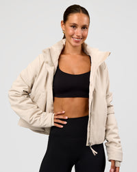Woman wearing Auxiliary 2.0 Jacket - Shale Beige | Model:Brylee | Size:XS
