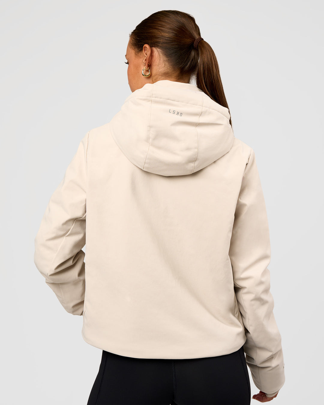 Woman wearing Auxiliary 2.0 Jacket - Shale Beige | Model:Brylee | Size:XS