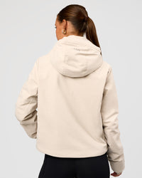 Woman wearing Auxiliary 2.0 Jacket - Shale Beige | Model:Brylee | Size:XS