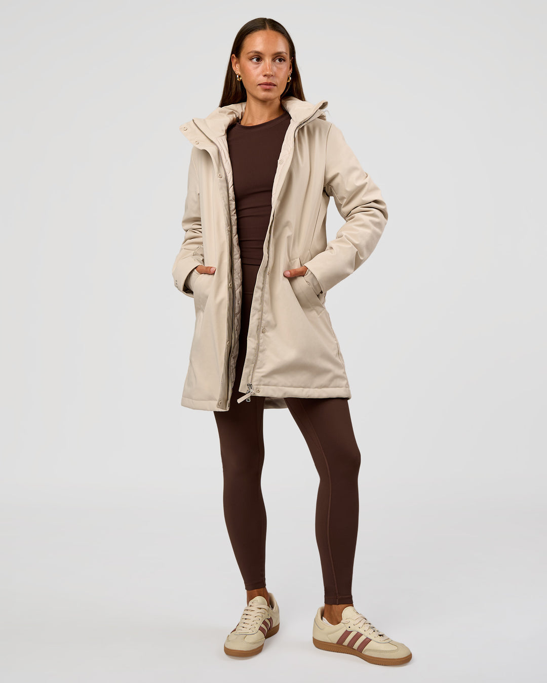 Woman wearing Auxiliary 2.0 Longline Jacket - Shale Beige | Model:Brylee | Size:XS