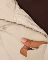 Woman wearing Auxiliary 2.0 Longline Jacket - Shale Beige | Model:Brylee | Size:XS