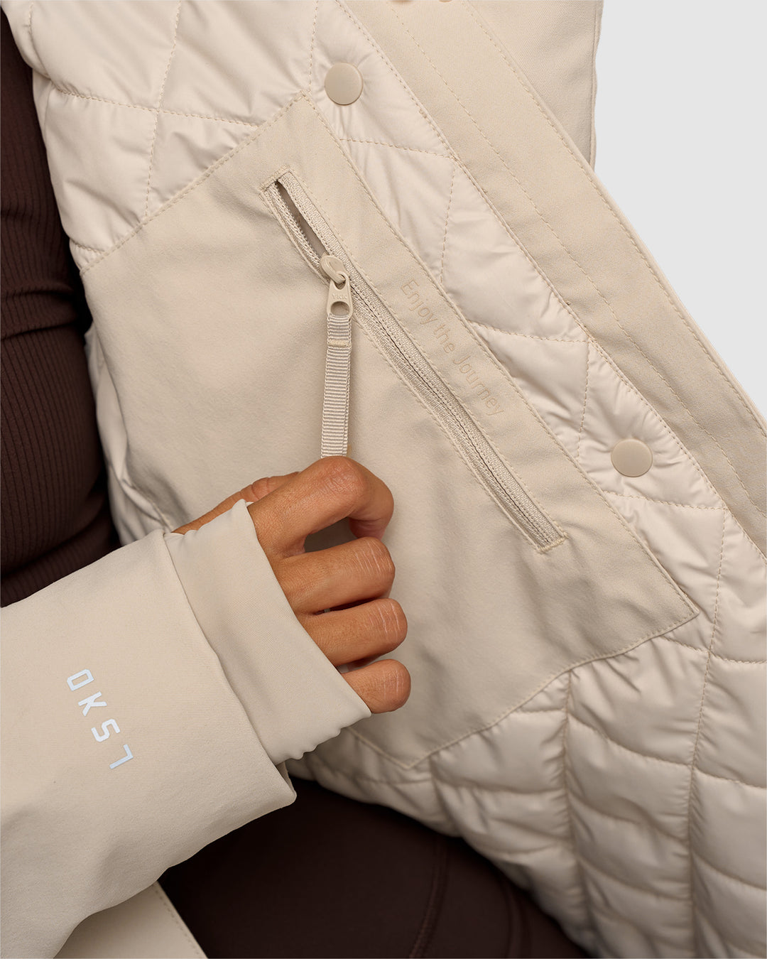 Woman wearing Auxiliary 2.0 Longline Jacket - Shale Beige | Model:Brylee | Size:XS