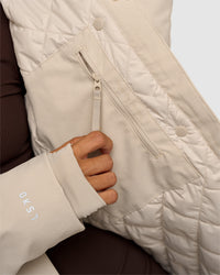 Woman wearing Auxiliary 2.0 Longline Jacket - Shale Beige | Model:Brylee | Size:XS