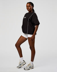 Woman wearing Axis Heavyweight Oversized Boxed Tee - Black-White | Model:Ellie | Size:XS