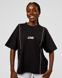 Woman wearing Axis Heavyweight Oversized Boxed Tee - Black-White | Model:Ellie | Size:XS