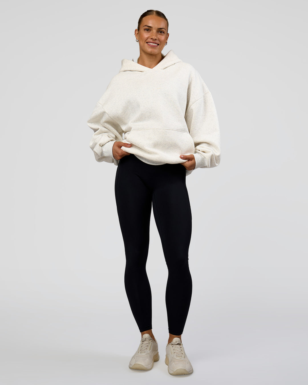Woman wearing Base Oversized Hoodie - Silver Marl | Model:Maja | Size:XS