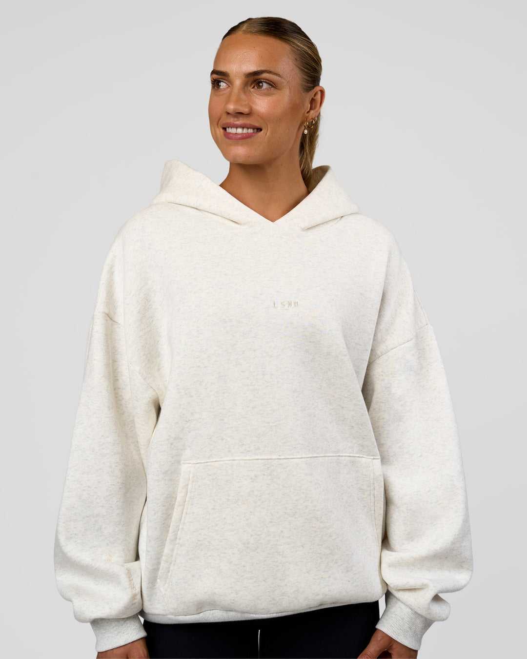 Woman wearing Base Oversized Hoodie - Silver Marl | Model:Maja | Size:XS