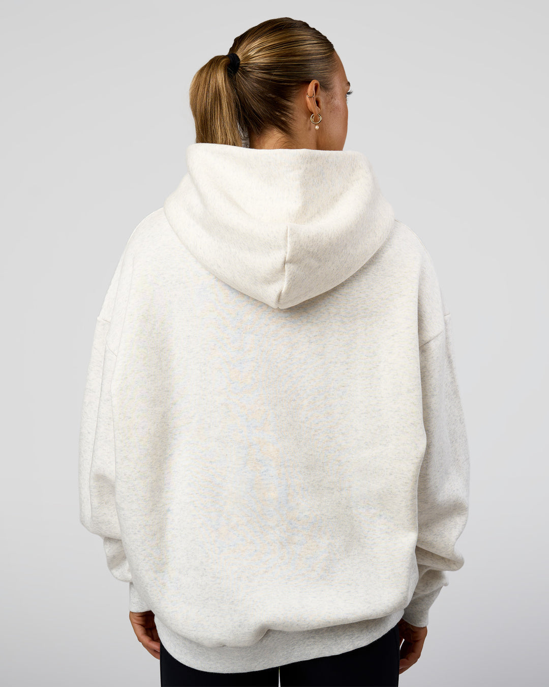 Woman wearing Base Oversized Hoodie - Silver Marl | Model:Maja | Size:XS