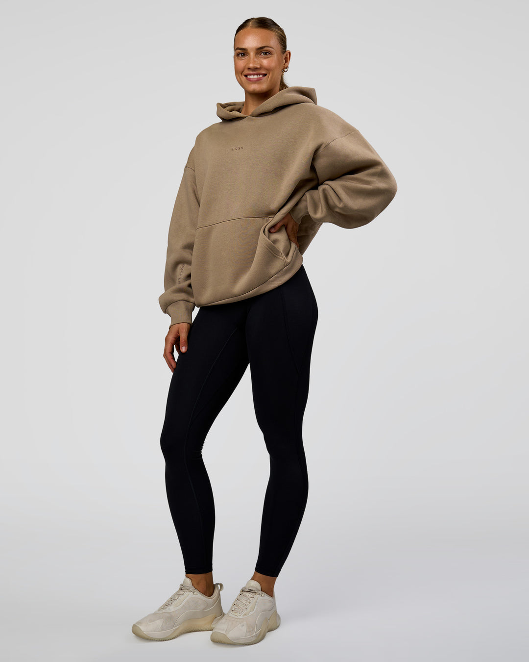 Woman wearing Base Oversized Hoodie - Taupe Ash | Model:Maja | Size:XS