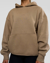 Woman wearing Base Oversized Hoodie - Taupe Ash | Model:Maja | Size:XS