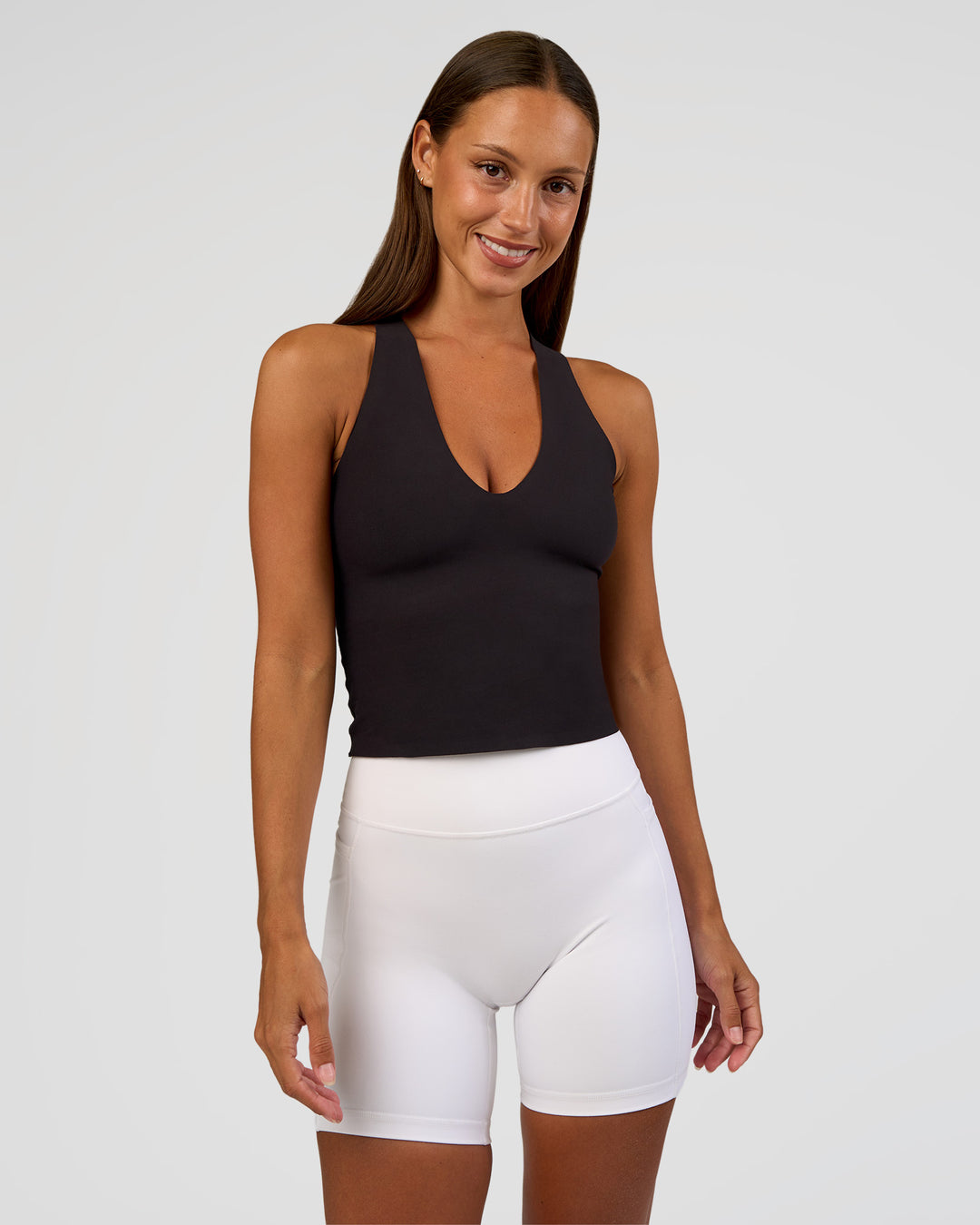 Woman wearing Bend &amp; FLX Plunge Tank - Black | Model:Brylee | Size:XS - view 4