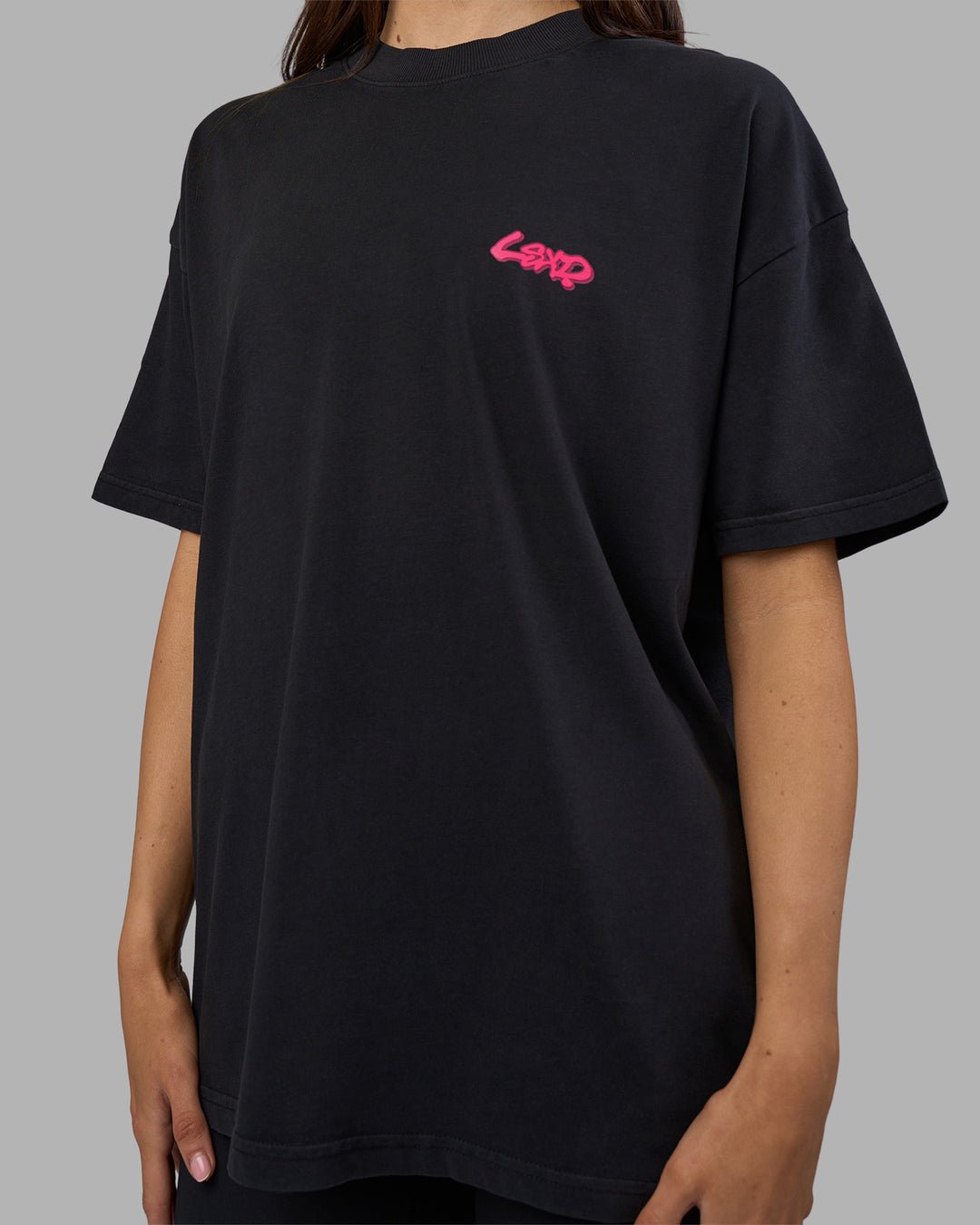 Woman wearing Break Through Heavyweight Oversized Tee - Black Washed-Plum Caspia | Model:Phoebe | Size:XS