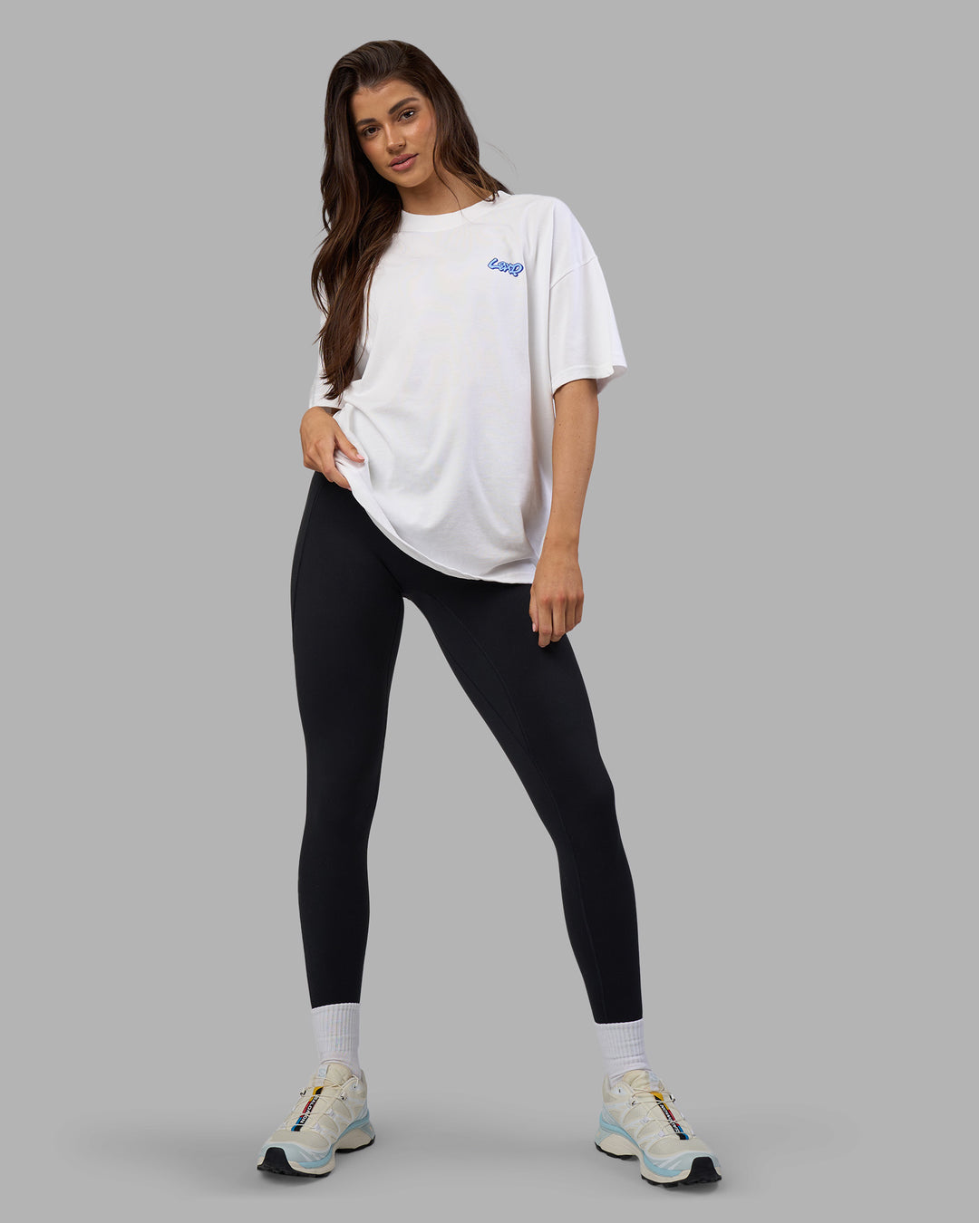 Woman wearing Break Through Heavyweight Oversized Tee - White-Power Cobalt | Model:Phoebe | Size:XS