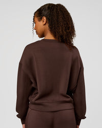 Woman wearing CF Elevate SoftTouch Pintuck Sweater - Hot Chocolate | Model:Jordan | Size:XS