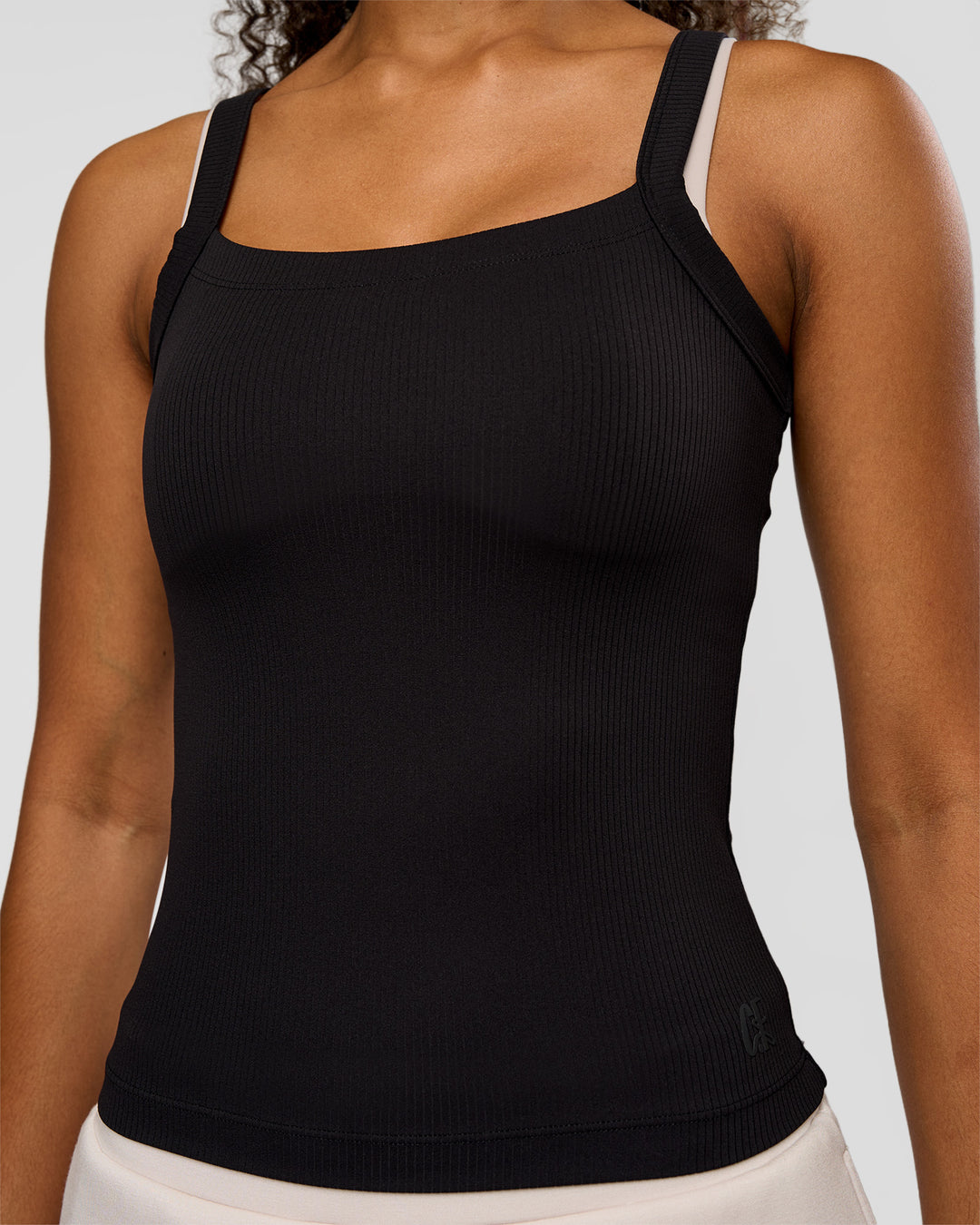 Woman wearing CF Move Through It Rib Tank - Black | Model:Jordan | Size:XS
