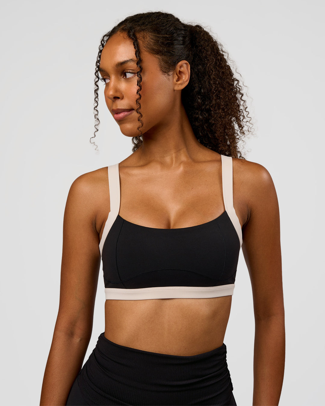 Woman wearing CF Move Through It Sports Bra - Black-Clay | Model:Jordan | Size:XS