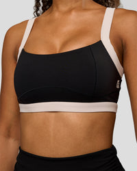 Woman wearing CF Move Through It Sports Bra - Black-Clay | Model:Jordan | Size:XS
