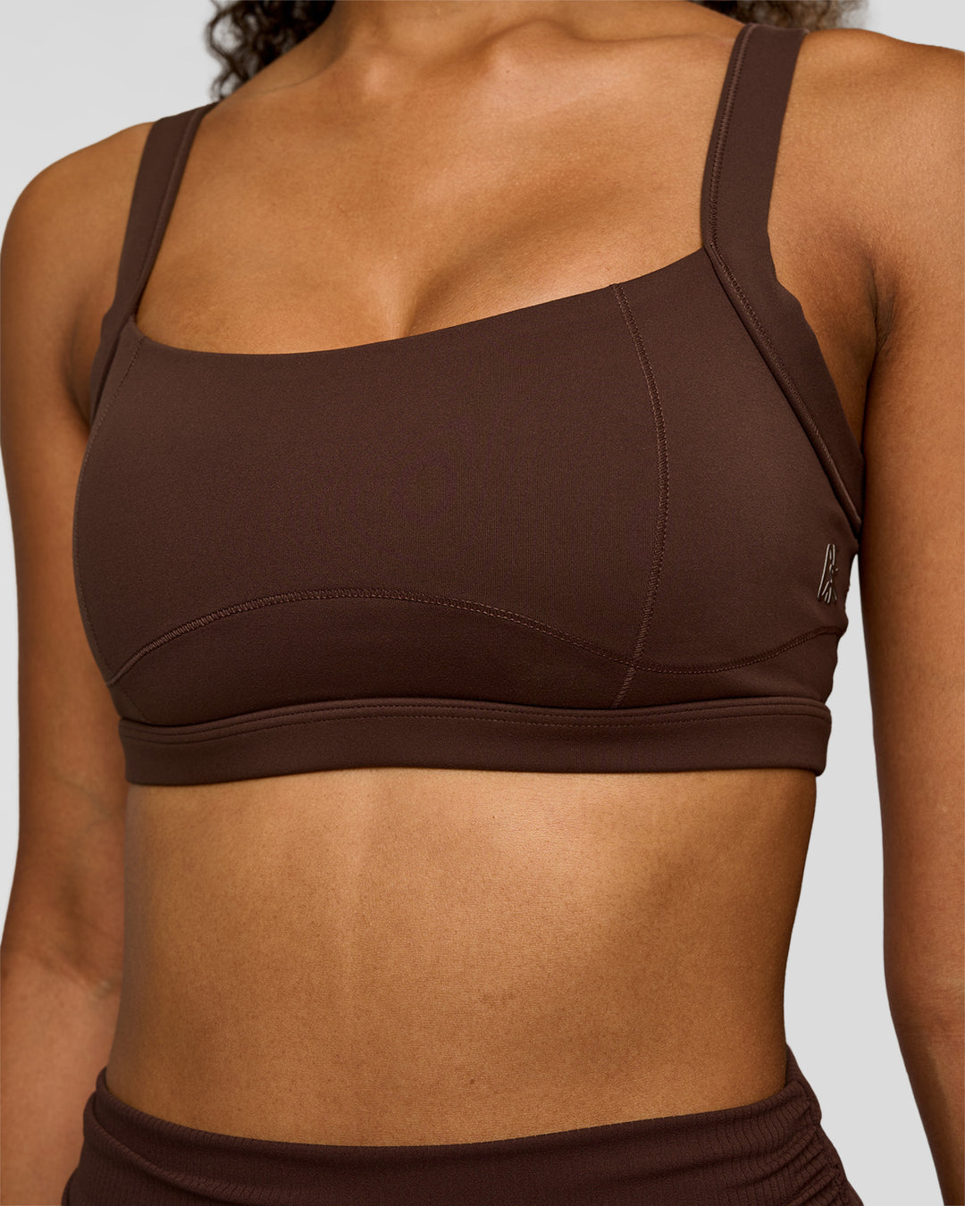 Woman wearing CF Move Through It Sports Bra - Hot Chocolate | Model:Jordan | Size:XS