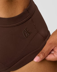 Woman wearing CF Move Through It Sports Bra - Hot Chocolate | Model:Jordan | Size:XS