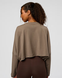 Woman wearing CF Street Surge Long Sleeve Tee - Taupe Ash | Model:Jordan | Size:XS | Thumbnail Index: 1