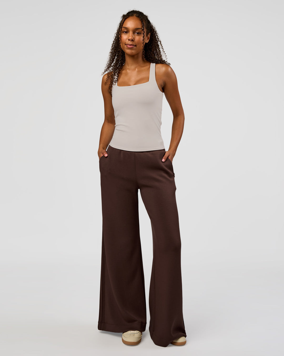 Woman wearing CF Train Hard Shelf Bra Tank - Clay | Model:Jordan | Size:XS