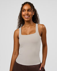 Woman wearing CF Train Hard Shelf Bra Tank - Clay | Model:Jordan | Size:XS