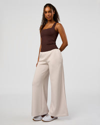 Woman wearing CF Train Hard Shelf Bra Tank - Hot Chocolate | Model:Jordan | Size:XS