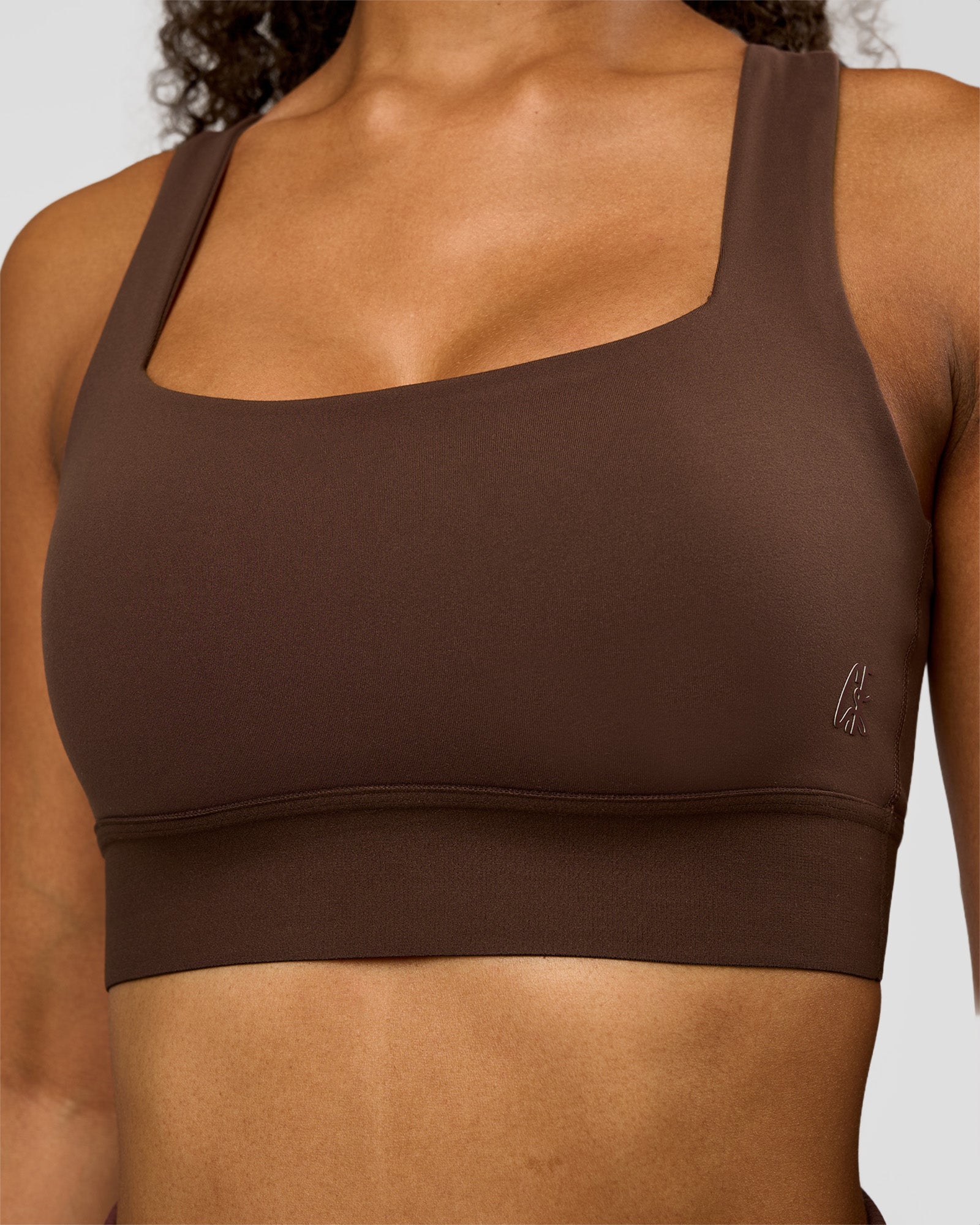 Woman wearing CF Train Hard Sports Bra - Hot Chocolate | Model:Jordan | Size:XS