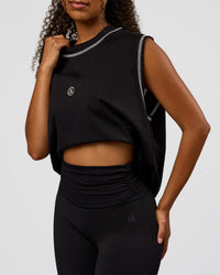 Woman wearing CF Unisex Oversized Heavyweight Boxed Tank - Black-CF X LSKD Sport | Model:Jordan | Size:XS | Thumbnail Index: 11