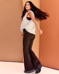 Woman wearing CF Unisex Oversized Heavyweight Boxed Tank - Clay-CF Move Through It | Model:Chloe | Size:XS