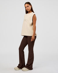 Woman wearing CF Unisex Oversized Heavyweight Boxed Tank - Clay-CF Move Through It | Model:Brylee | Size:XS