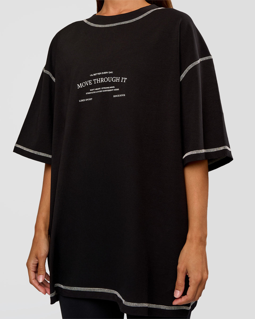 Woman wearing CF Unisex Oversized Heavyweight FLXCotton Tee - Black-CF Move Through It | Model:Brylee | Size:XS