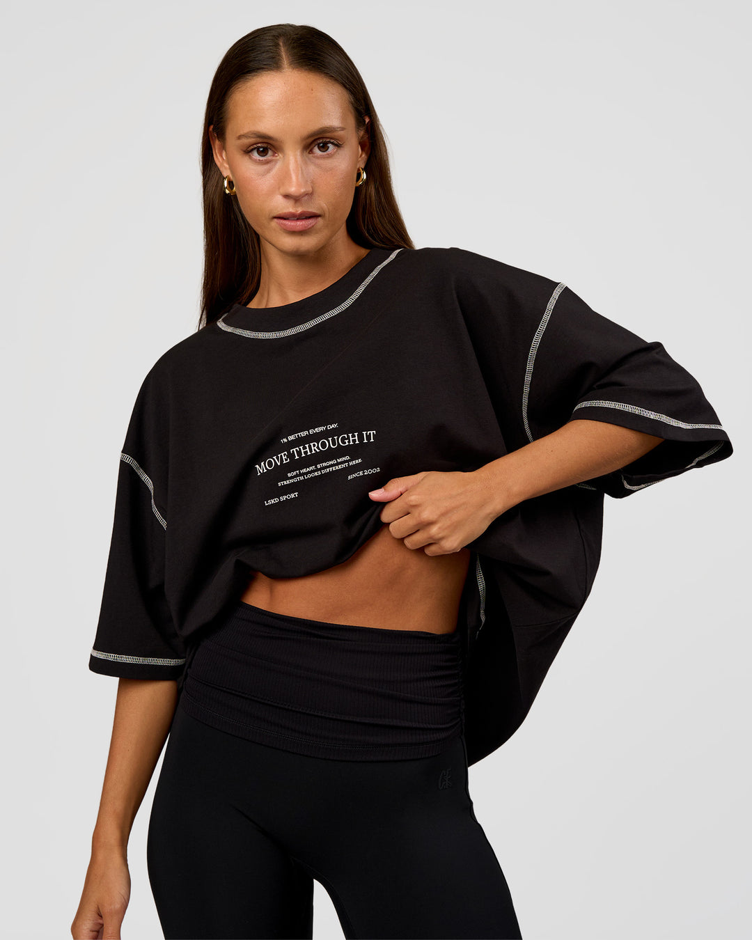 Woman wearing CF Unisex Oversized Heavyweight FLXCotton Tee - Black-CF Move Through It | Model:Brylee | Size:XS