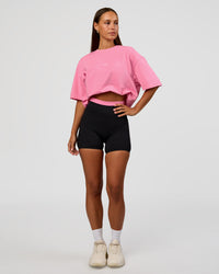 Woman wearing CFT BNE 26 FLXCotton Oversized Tee in Candy Pink | Model:Brylee | Size:XS