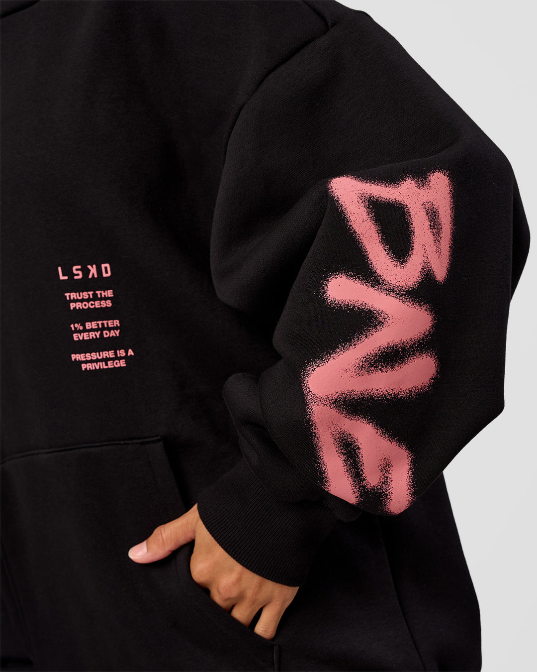 Woman wearing CFT BNE 26 Unisex Oversized Hoodie - Black-Candy Pink | Model:Brylee | Size:XS - view 13